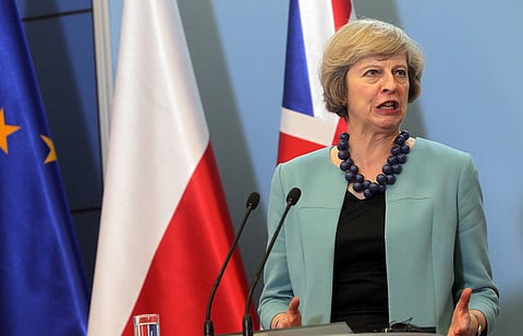 Britain's Prime Minister Theresa May attends a news conference at the Prime Minister's Chancellery in Warsaw, Poland July 28, 2016. Agencja Gazeta/Przemek Wierzchowski/via REUTERS