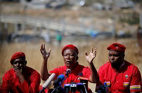 Julius Malema, leader of South Africa's Economic Freedom Fighters (EFF), gestures during a media briefing in Alexander township near Sandton, South Africa August 17, 2016. REUTERS/Siphiwe Sibeko