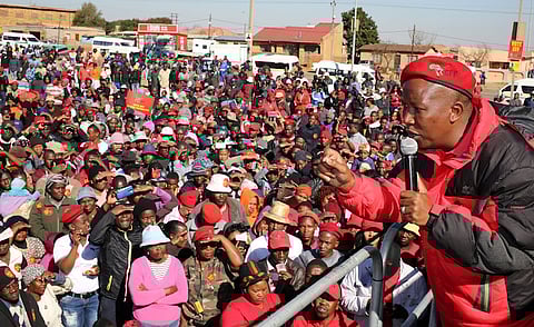 Julius Malema, the firebrand leader of South Africa's Economic Freedom Fighters (EFF) addresses his supporters. REUTERS/Siphiwe Sibeko.