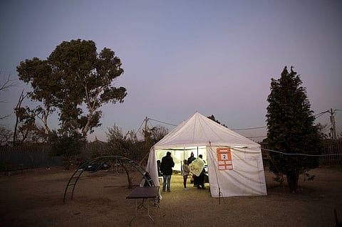 Locals cast their votes during the local government elections in Alexandra Township outside Johannesburg, South Africa August 3,2016. REUTERS/James Oatway