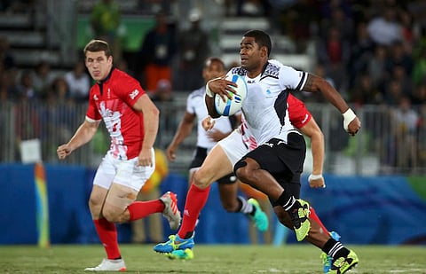 2016 Rio Olympics - Rugby - Men's Gold Medal Match - Fiji v Great Britain - Deodoro Stadium - Rio de Janeiro, Brazil - 11/08/2016. Vatemo Ravouvou (FIJ) of Fiji runs in for a try. REUTERS/Alessandro Bianchi