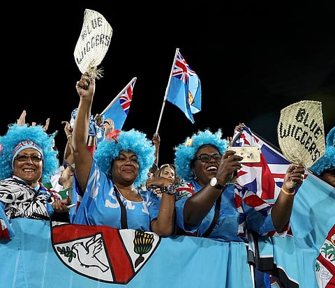 2016 Rio Olympics - Rugby - Men's Victory Ceremony - Deodoro Stadium - Rio de Janeiro, Brazil - 11/08/2016. Fiji rugby fans cheer during ceremony. REUTERS/Phil Noble