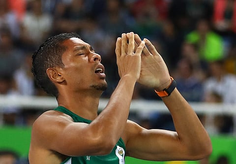 Wayde van Niekerk (RSA) of South Africa and his sweetheart reacts after setting a new world record and winning the gold medal. REUTERS/Kai Pfaffenbach FOR EDITORIAL USE ONLY. NOT FOR SALE FOR MARKETING OR ADVERTISING CAMPAIGNS.
