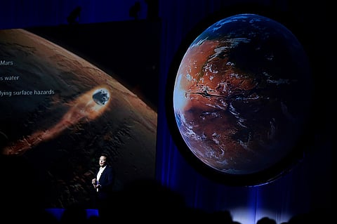 Elon Musk, chief executive officer for Space Exploration Technologies Corp. (SpaceX), speaks during the 67th International Astronautical Congress (IAC) in Guadalajara, Mexico, on Tuesday, Sept. 27, 2016. Musk's vision for building a self-sustaining city on Mars will require full rocket reusability, refueling the spacecraft in orbit and propellant production on the Red Planet. Photographer: Susana Gonzalez/Bloomberg
