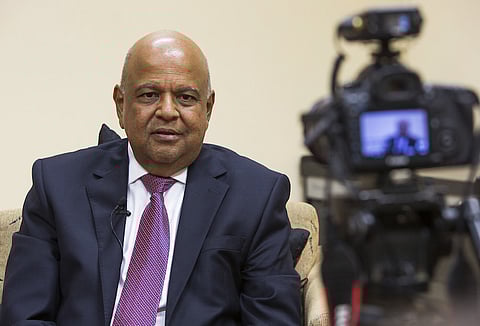 Pravin Gordhan, South Africa's finance minister, speaks during a Bloomberg Television interview following his budget speech in Cape Town, South Africa, on Wednesday, Feb. 22, 2017. Gordhan cut his spending ceiling and stuck to deficit targets, holding his ground in a feud with President Jacob Zuma for control of the nation's finances. Photographer: Halden Krog/Bloomberg