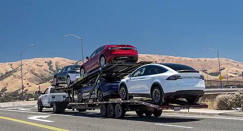 Tesla Inc. vehicles are transported on a truck after leaving the company's manufacturing facility in Fremont, California, U.S., on Wednesday, June 20, 2018. Photographer: David Paul Morris/Bloomberg