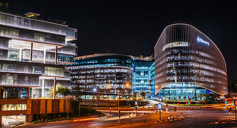 Lights illuminate the windows of the Discovery Ltd. headquarters office in the Sandton district of Johannesburg, South Africa. Photographer: Waldo Swiegers/Bloomberg
