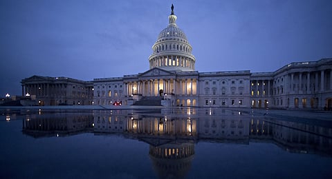 The US Capitol is reflected in a Capitol Visitor Centre fountain in Washington, DC, US Photographer: Andrew Harrer/Bloomberg