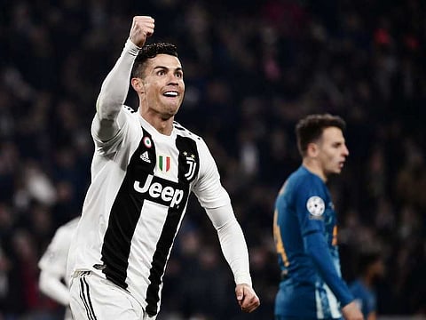 Cristiano Ronaldo celebrates scoring against Atletico Madrid on March 12. Photographer: Marco Bertorello/AFP/Getty Images/AFP via Getty Images