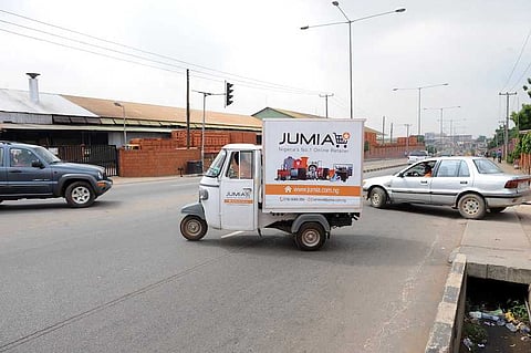 A Jumia tricycle heads to deliver products to clients in Lagos. Photographer: Pius Utomi Ekpei/AFP/Getty Images
