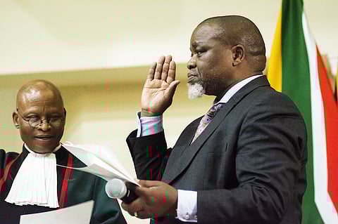 Gwede Mantashe, South Africa's mineral resources and energy minister, gestures during a swearing-in ceremony in Pretoria, South Africa, on Thursday, May 30, 2019. Now that South Africa's cabinet has been announced, the rand may join its emerging-market peers in being whipsawed by a trade war that has subdued markets worldwide. Photographer: Waldo Swiegers/Bloomberg