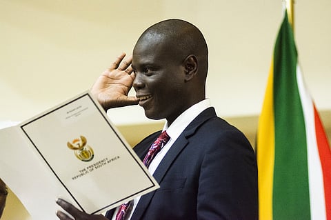 Ronald Lamola, South Africa's justice minister, gestures as he speaks during a swearing-in ceremony in Pretoria, South Africa, on Thursday, May 30, 2019. Now that South Africa's cabinet has been announced, the rand may join its emerging-market peers in being whipsawed by a trade war that has subdued markets worldwide. Photographer: Waldo Swiegers/Bloomberg