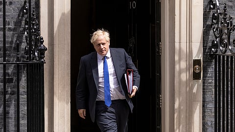 LONDON, ENGLAND - JULY 06: Prime Minister Boris Johnson leaves 10 Downing Street for PMQ's on July 6, 2022 in London, England. Minister for Health, Sajid Javid, resigned from the Government on Tuesday evening, closely followed by the Chancellor of The Exchequer, Rishi Sunak. Boris Johnson moved swiftly to shore up his Prime Ministership making his Chief of Staff, Steve Barclay, Minister for Health and promoting Education Secretary Nadim Zahawi, to Chancellor of the Exchequer. (Photo by Dan Kitwood/Getty Images)