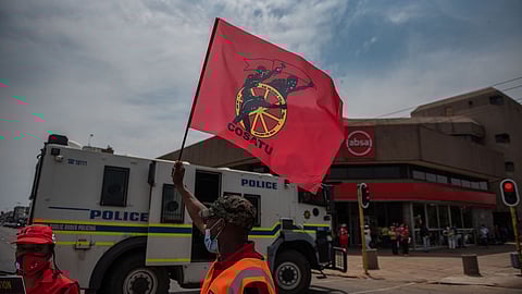 RUSTENBURG, SOUTH AFRICA - OCTOBER 07: Workers affiliated to COSATU during the Congress of South African Trade Unions (COSATU) National Day of Action on October 07, 2021 in Rustenburg, South Africa. The trade union, COSATU called on its members to participate in a nationwide strike against measures to freeze wages in the private and public sectors and also to draw attention to high levels of unemployment in the country. (Photo by Gallo Images/Alet Pretorius)