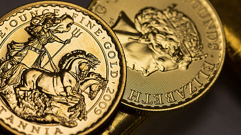 One-ounce Britannia gold coins stacked at Gold Investments Ltd. bullion dealers arranged in London, U.K., on Thursday, March 17, 2022. Gold rose for a second day as investors weigh the trajectory of the Federal Reserve’s rates tightening cycle against risks to growth from the war in Ukraine. Photographer: Chris Ratcliffe/Bloomberg