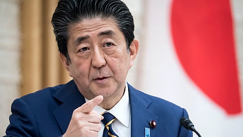 TOKYO, JAPAN - APRIL 07: Japan's Prime Minister Shinzo Abe speaks during a press conference at the prime minister's official residence on April 07, 2020 in Tokyo, Japan. The Japanese Prime Minister has declared a state of emergency that will cover 7 of Japan’s 47 prefectures, including Tokyo and Osaka, as the Covid-19 coronavirus outbreak continues to spread in the country. The move will allow affected prefectures to take measures including expropriating private land and buildings and requisitioning medical supplies and food from companies that refuse to sell them. (Photo by Tomohiro Ohsumi/Getty Images)