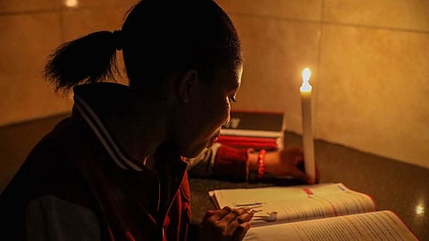 Blackouts are leaving South Africans in darkness for up to 10 hours a day as a years-long energy crisis escalates (Photo by Gallo Images/Papi Morake)