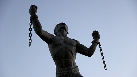 The Emancipation Statue symbolizing the breaking of the chains of slavery at the moment of emancipation is shown on November 16, 2021 in Bridgetown, Barbados. On November 30, the 55th anniversary of the country’s independence from the United Kingdom, Barbados will remove Queen Elizabeth as head of state and swear in a local president, transitioning to a republic and shedding its colonial past. (Photo by Joe Raedle/Getty Images)