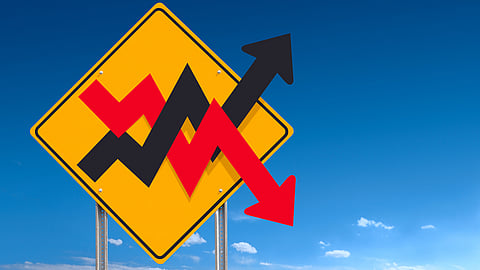 An informational traffic sign post indicating a financial market business concept - a clipping path is included to separate sign from bkg.