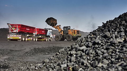 A truck loaded with coal at an open-cast coal mine, operated by Exxaro Resources Ltd. and Thungela Resources Ltd., in Mpumalanga, South Africa, Sept. 9. Photographer: Waldo Swiegers/Bloomberg