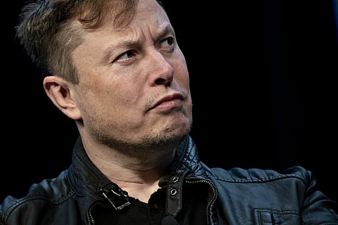 Elon Musk, founder of SpaceX and chief executive officer of Tesla Inc., listens during a discussion at the Satellite 2020 Conference in Washington, D.C., U.S., on Monday, March 9, 2020. The event comprises important topics facing both satellite industry and end-users, and brings together a diverse group of thought leaders to share their knowledge.