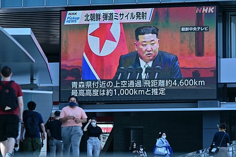 A screen showing images of Kim Jong Un in Tokyo on Oct. 4.