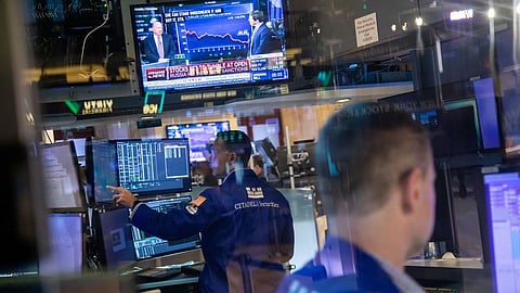 Traders work on the floor of the New York Stock Exchange (NYSE) in New York, U.S., on Monday, Feb. 28, 2022. Investors are facing a risk most of them have never seen in their lifetimes -- a major crossborder war in Europe -- and that’s wreaking havoc across financial markets. Photographer: Michael Nagle/Bloomberg