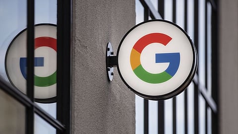 A logo outside the Google Store Chelsea in New York, U.S., on Friday, May 28, 2021. The Google Store will display and sell a variety of product such as Pixel phones, Nest smart home devices, Fitbit trackers, Pixelbooks, and more. Photographer: Victor J. Blue/Bloomberg