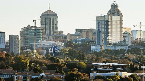Buildings stand in the Central Business District (CBD) on the city skyline of Johannesburg, South Africa, on Thursday, June 22, 2017. South Africa’s inflation rate rose for the first time this year in May after food-price growth quickened from the slowest pace since December 2015. Photographer: Waldo Swiegers/Bloomberg