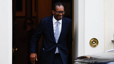 Kwasi Kwarteng, former UK chancellor of the exchequer, departs 11 Downing Street, after stepping down as chancellor, in London, UK, on Friday, Oct. 14, 2022. Kwarteng confirmed Liz Truss asked him to leave his post as UK Chancellor of the Exchequer, following weeks of market turmoil triggered by the massive package of unfunded tax cuts he announced last month. Photographer: Carlos Jasso/Bloomberg