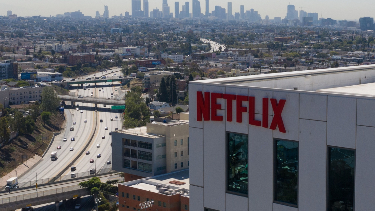 Netflix stocks surge with return to growth, saying the worst of slowdown is over