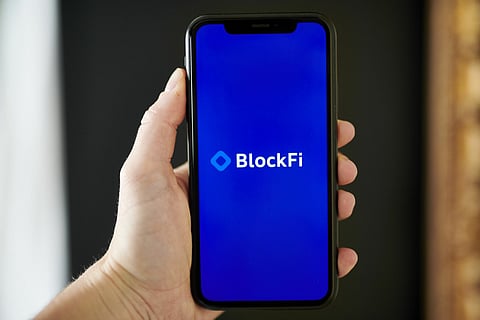 The BlockFi logo on a smartphone arranged in Little Falls, New Jersey, U.S., on Saturday, May 22, 2021. Elon Musk continued to toy with the price of Bitcoin Monday, taking to Twitter to indicate support for what he says is an effort by miners to make their operations greener. Photographer: Gabby Jones/Bloomberg