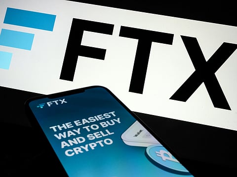 LONDON, ENGLAND - NOVEMBER 10: In this photo illustration the FTX logo and mobile app adverts are displayed on screens on November 10, 2022 in London, England. The Bahamas-based crypto exchange's larger rival, Binance, walked away from a potential bailout deal, as FTX struggles with a wave of customer withdrawals that have created a liquidity crunch. (Photo Illustration by Leon Neal/Getty Images)