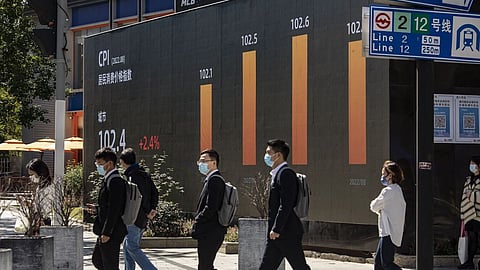 A public screen displays the consumer price index (CPI) figures in Shanghai, China, on Monday, Oct. 10, 2022. Chinese semiconductor stocks slumped after fresh US curbs on China’s access to American technology added to a disappointing start to the earnings season, stoking concerns that the industry’s downturn is far from over. Photographer: Qilai Shen/Bloomberg
