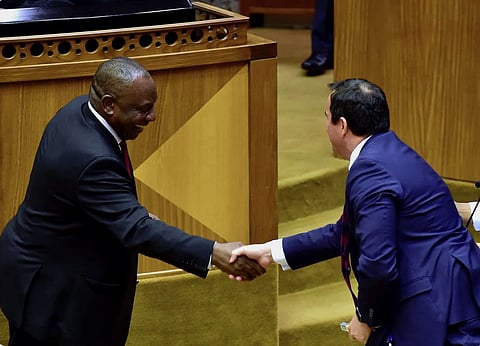 Cyril Ramaphosa and John Steenhuisen shake hands in Parliament. Courtesy: ActionSA