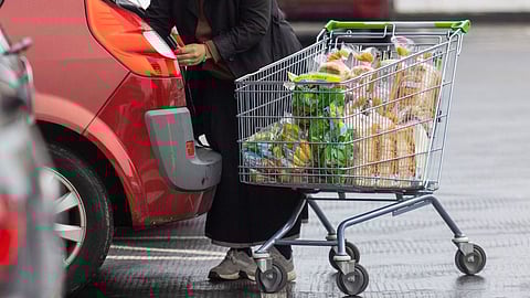 A shopper loads her car with food shopping at an Asda supermarket in Folkestone, UK, on Monday, Nov. 14, 2022. Photographer: Chris Ratcliffe/Bloomberg