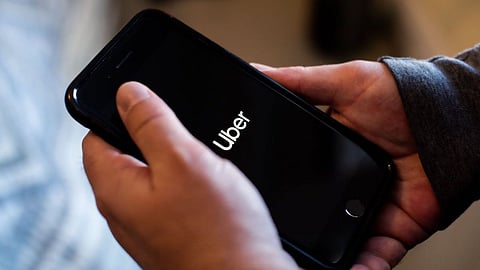 The Uber app, showing Uber XL, is displayed on a mobile phone in an arranged photo in Dobbs Ferry NY, Saturday February 6, 2021. Photographer: Tiffany Hagler-Geard/Bloomberg