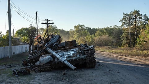 A destroyed Russian tank on the roadside in Izyum, Ukraine. Photographer: Carl Court/Getty Images