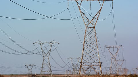High voltage electricity transmission towers in Mpumalanga, South Africa on Thursday, Sept. 29, 2022. South Africa relies on coal to generate more than 80% of its electricity, and has been subjected to intermittent outages since 2008 because state utility Eskom Holdings SOC Ltd. can't meet demand from its old and poorly maintained plants. Photographer: Waldo Swiegers/Bloomberg