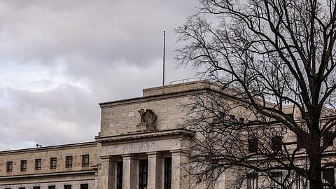 Federal Reserve signals prolonged restrictive stance, open door to potential rate cuts in 2024