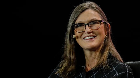 Cathie Wood defies Wall Street gloom, resumes Tesla stock purchases amid EV challenges