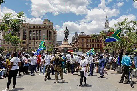 Protestors march under the banner "#Put South Africans First" against the extension of Zimbabwean Exemption Permit Renewals in Pretoria, in 2021. Photographer: Phill Magakoe/AFP/Getty Images