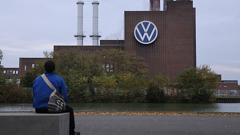 Volkswagen to close factories, cut wages as auto crisis deepens