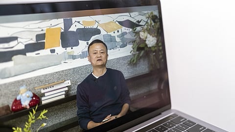 A video recording of a livestream of Jack Ma, co-founder of Alibaba Group Holding Ltd., addressing teachers at an annual event he hosts to recognize rural educators, on a laptop computer arranged in Hong Kong, China, on Wednesday, Jan. 20, 2021. Ma has resurfaced after months out of public view that fueled intense speculation about the plight of the billionaire grappling with escalating scrutiny over his internet empire. Photographer: Justin Chin/Bloomberg