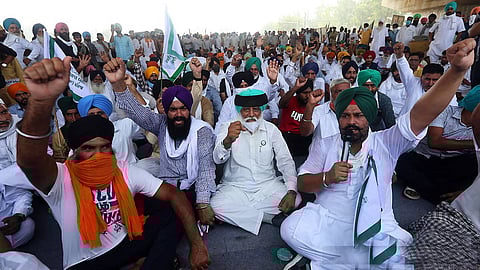 Farmers see a threat under the new laws to wheat and rice procurement