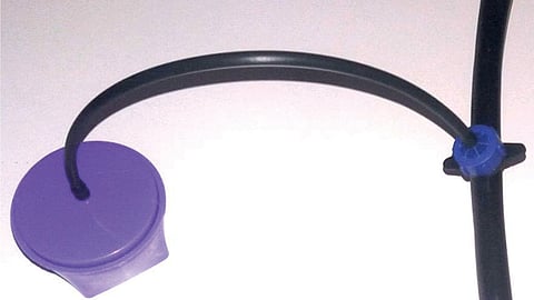 The system is retrofittable into existing drip irrigation systems, depositing moisture underground near the plant’s root. Credit: SWAR