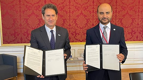 La Camera and Alkhalifa signing an MoU in Vienna to formalize cooperation