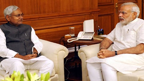 Modi with Nitish: a new dynamic to the alliance; Photo: PIB