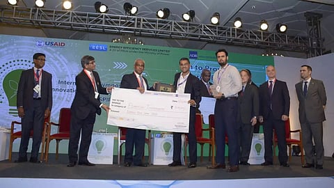 Receiving the InnovatetoInspire award at an EESL summit