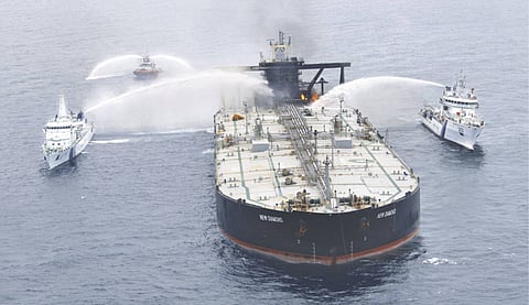 Indian Coast Guard ships dousing a raging fire on board VLCC, MT New Diamond, off Sri Lanka